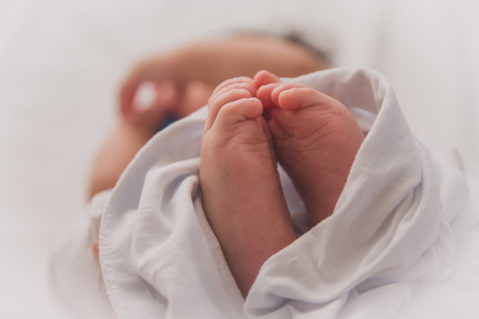 Celebrating the Arrival of a New Baby with Flowers and Gifts